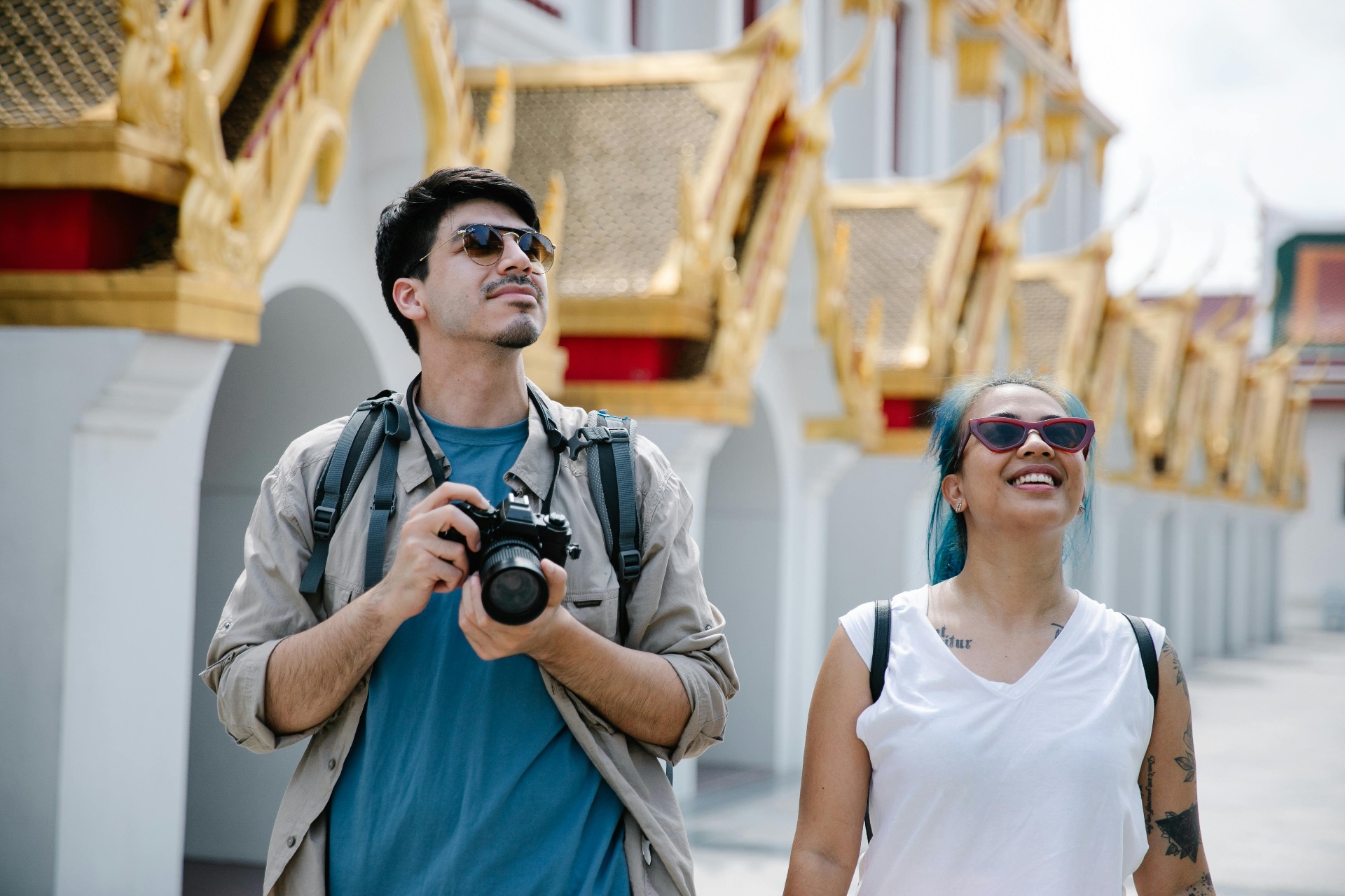 Travelers exploring a destination with a camera